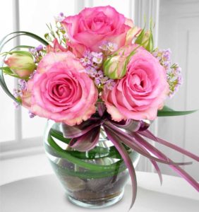 Pink Sweet Unique roses and pink rosebuds make this a feminine, simple, and thoughtful gift for a special person!