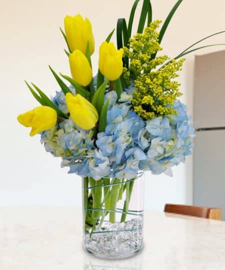 Celebrate Spring or any special occasion with this beautiful arrangement of tulips and hydrangea.
